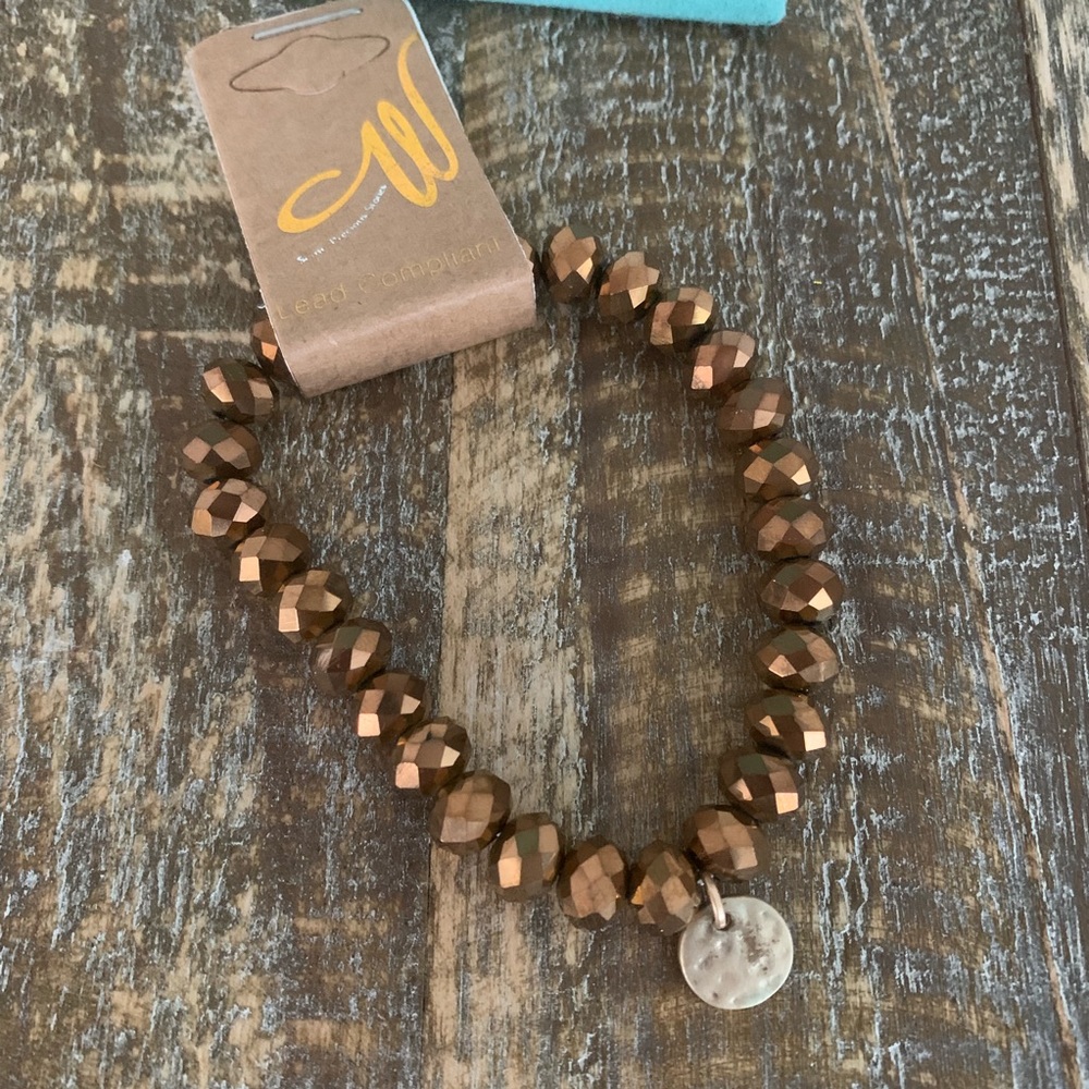 Beaded bracelet with embellishment